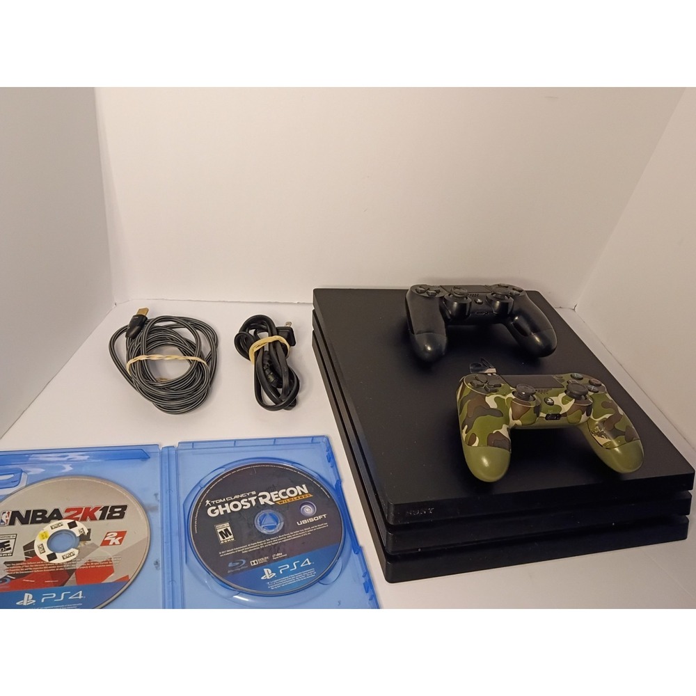 Sony PS4 Pro 1TB Console Bundle - Controller & Charger games serviced